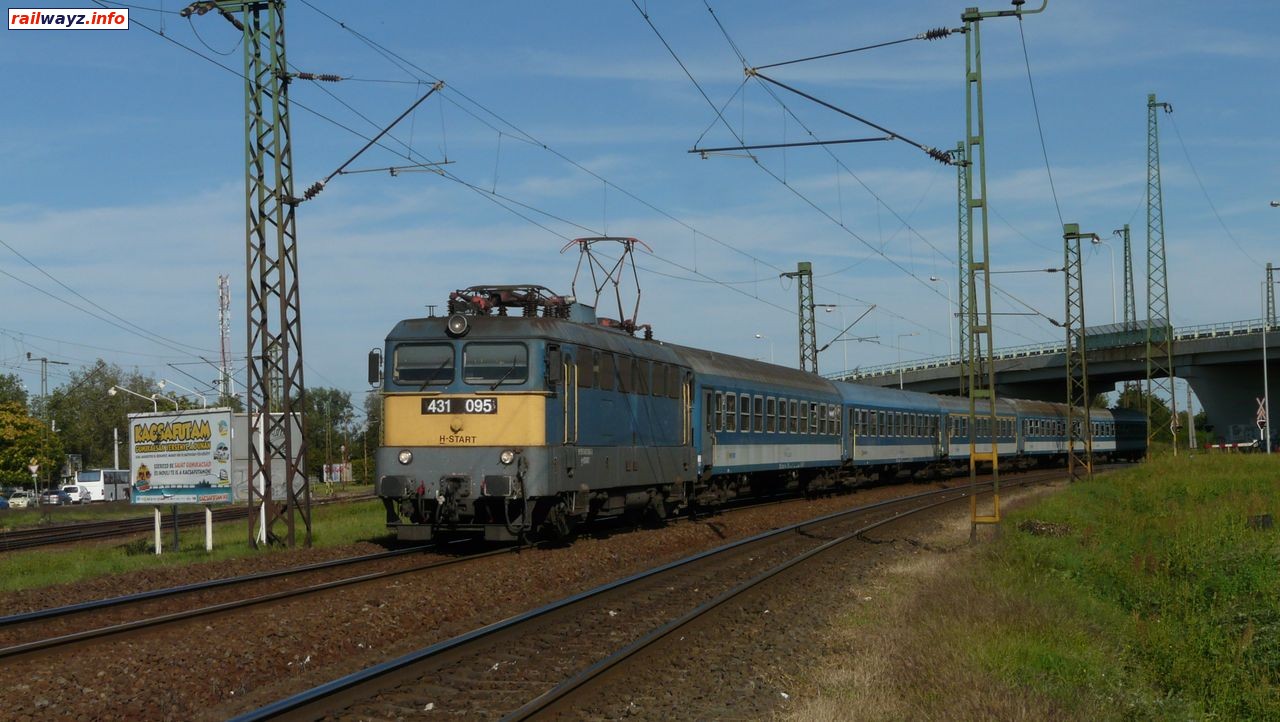 Электровоз 431 095 с поездом на ст. Ракош