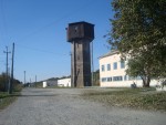 станция Кривин: Пост ЭЦ и водонапорная башня. Вид со стороны пристанционной площади