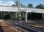 станция Подлипки-Дачные: Новый путь и новый пешеходный переходной мост у западной горловины, вид в чётном направлении